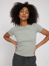 Jade ist 1,75 und trägt Größe S