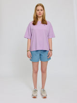 Amber ist 1,74 und trägt Größe S